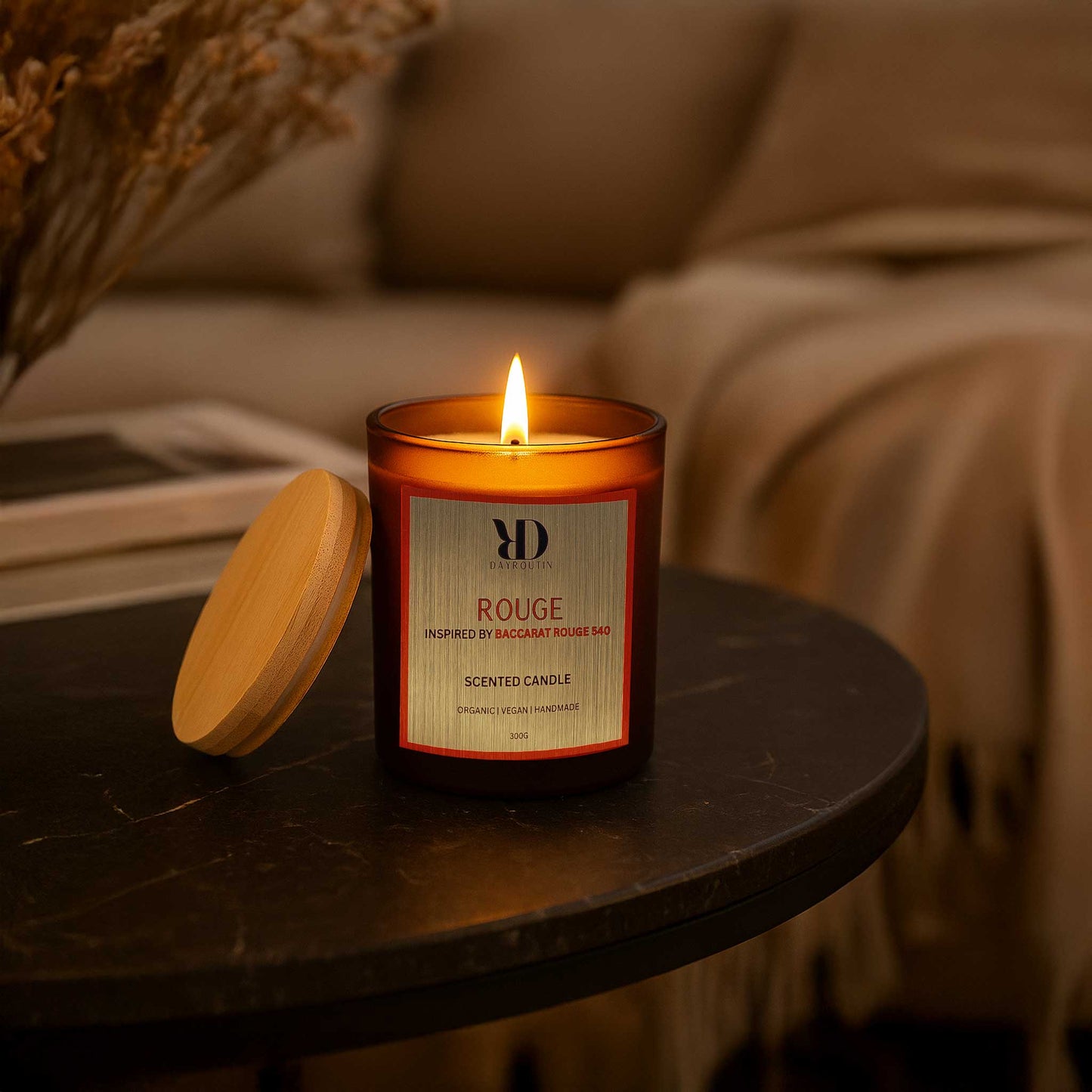 BACCARAT ROUGE Scented Candle. Experience the iconic luxury scent of saffron, jasmine, and amberwood at home.