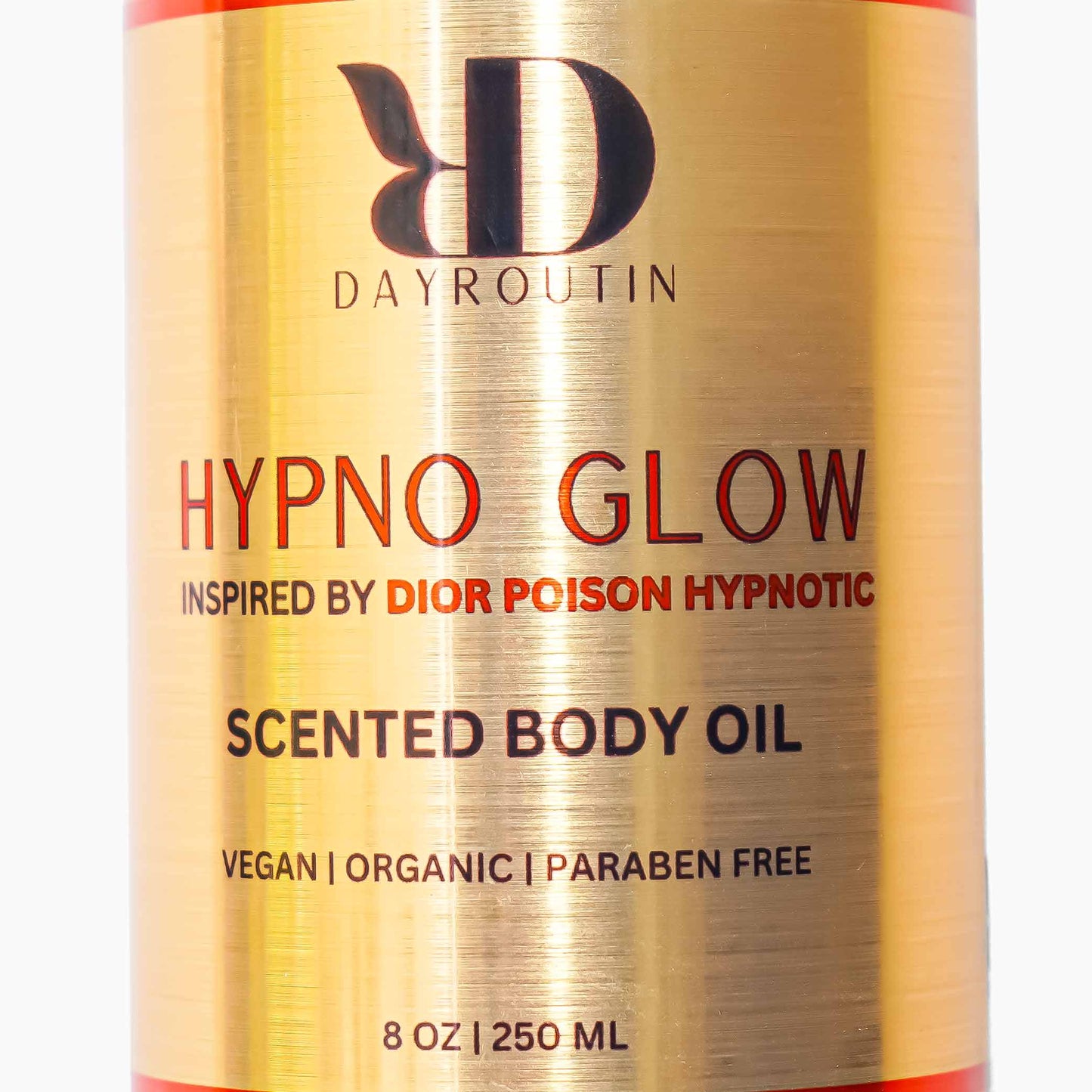 Woman applying scented body oil to legs for glowing skin