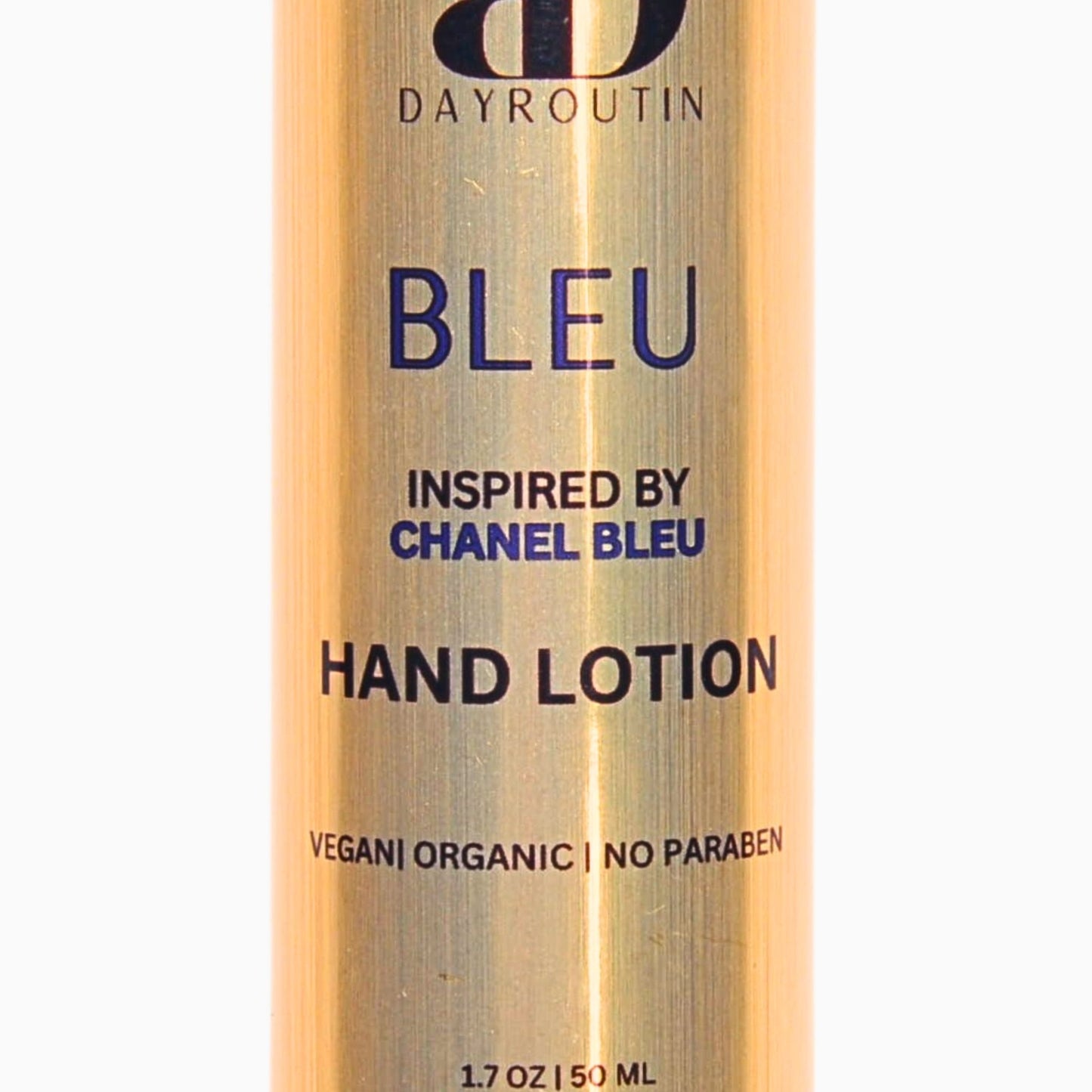 BLEU hand lotion on mens grooming station next to razor and cologne bottle.