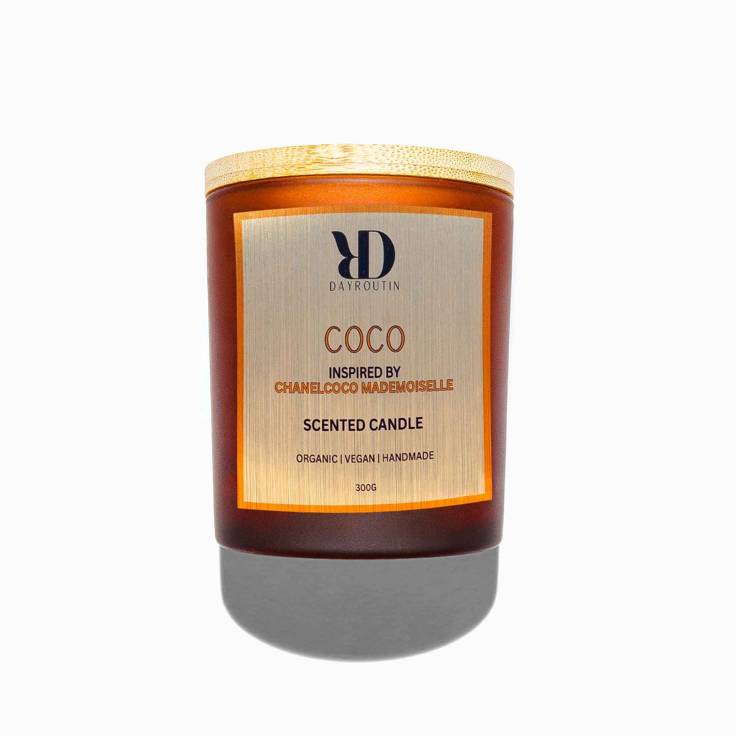 DayRoutin COCO scented candle inspired by Chanel Coco Mademoiselle in elegant glass jar.