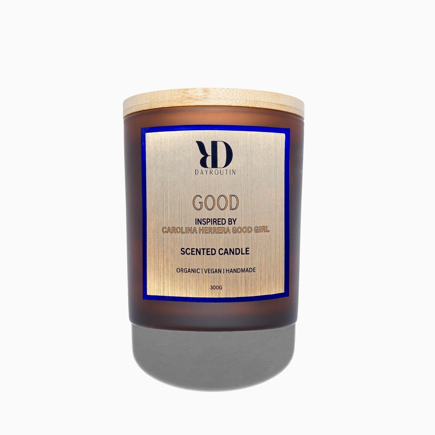 DayRoutin GOOD scented candle inspired by Carolina Herrera Good Girl perfume in minimalist glass jar.