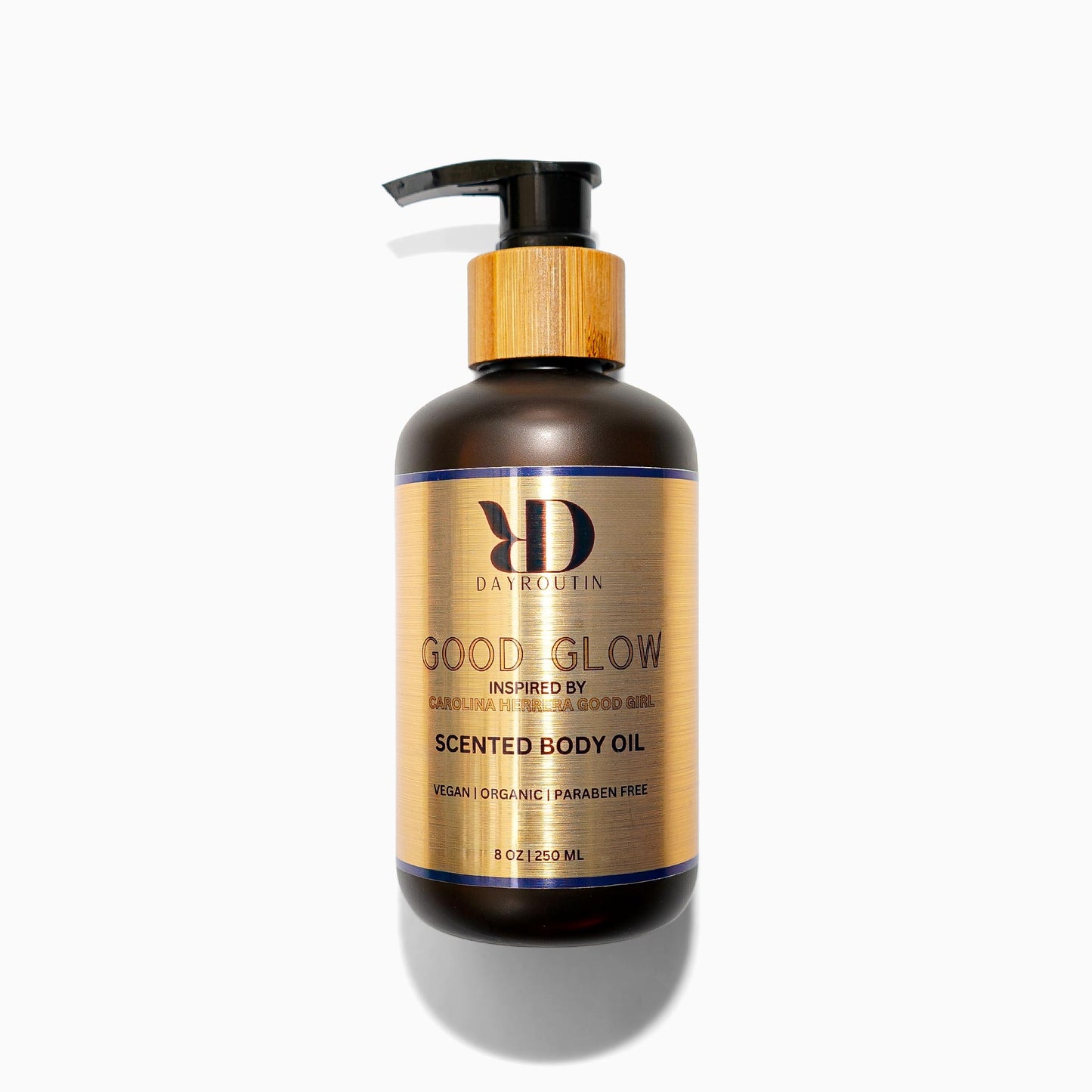 DayRoutin GOOD GLOW body oil inspired by Carolina Herrera Good Girl in an elegant bottle.