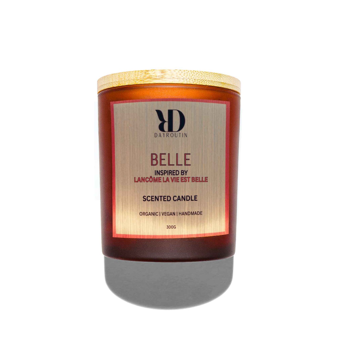 Lancôme La Vie Est Belle inspired soy candle burning on coffee table