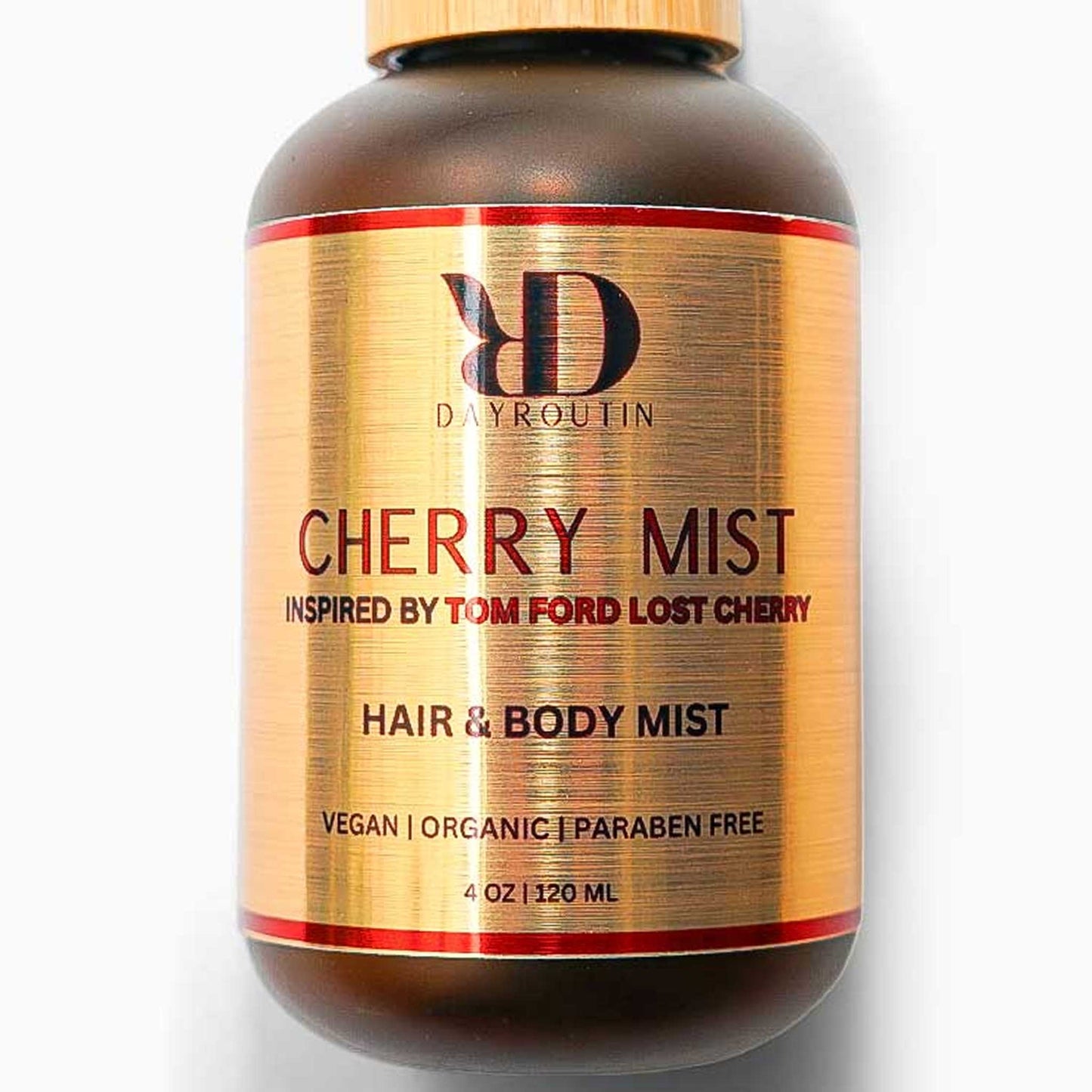 "Boozy cherry and almond body spray smelling like Tom Ford"