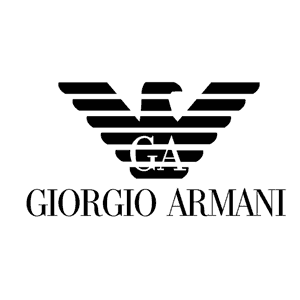 Armani Sì Bundle featuring the elegant nude-toned fragrance bottle with its signature black cap and matching luxury body lotion in a high-end setting.