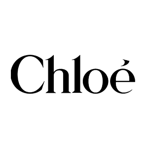 Chloé Signature Bundle featuring the iconic pleated fragrance bottle with its hand-tied beige ribbon and matching luxury body lotion.