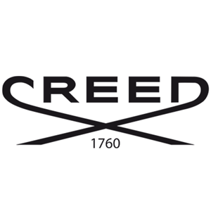 Creed Aventus Bundle featuring the iconic black-and-silver bottle with the emperor emblem and matching luxury grooming products in an opulent, dark setting.